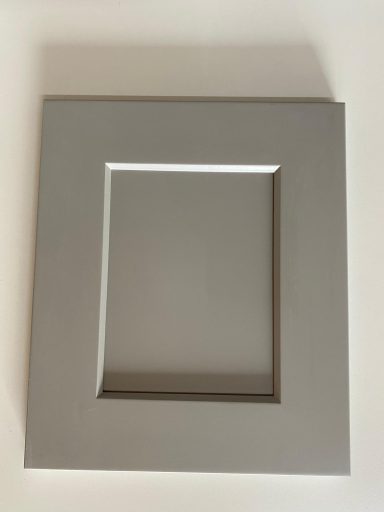 Gray rectangular picture frame with a smaller inset area.